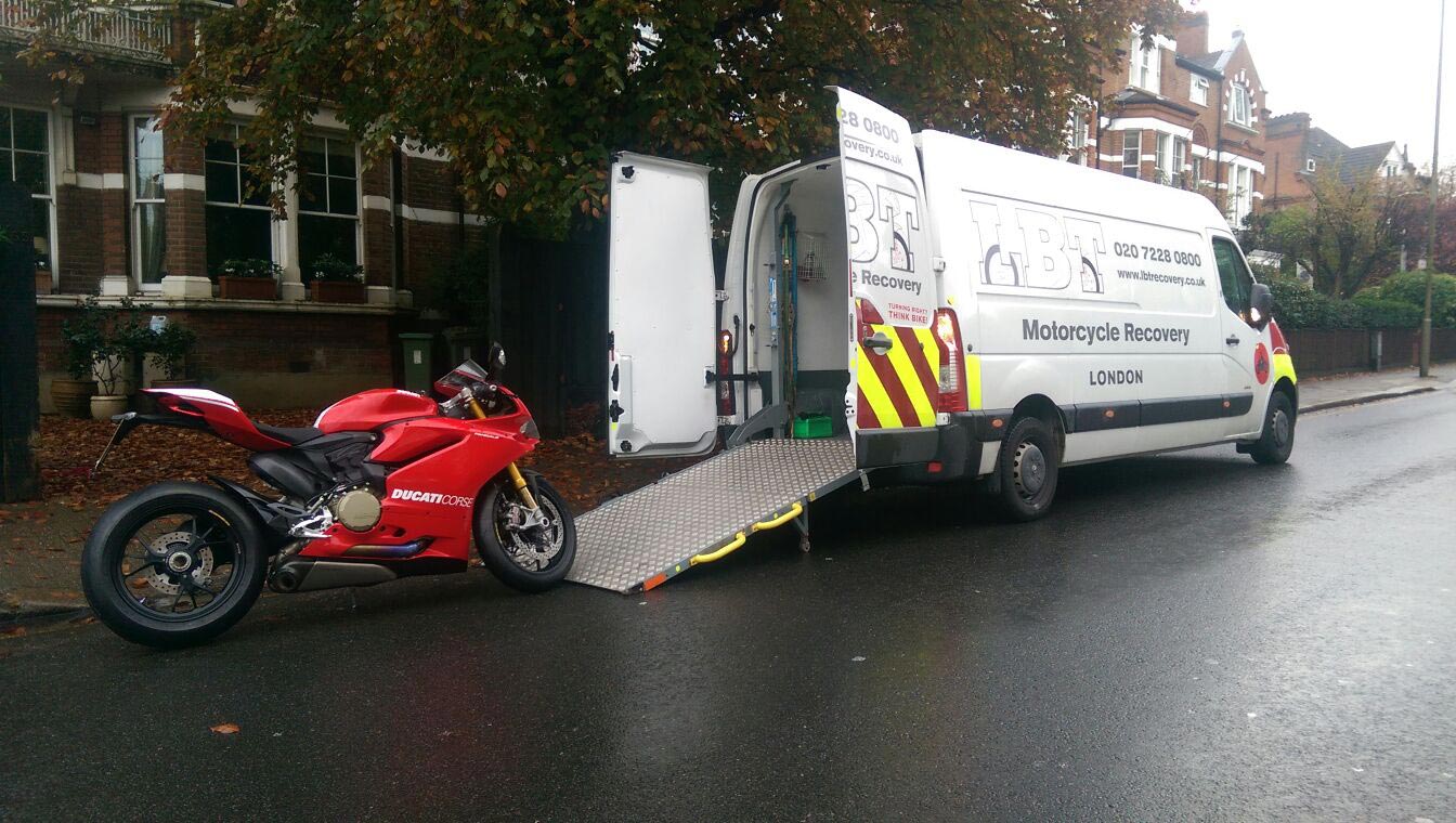 Red Ducati Panegali  being loaded | LBT Motorcycle Recovery | London