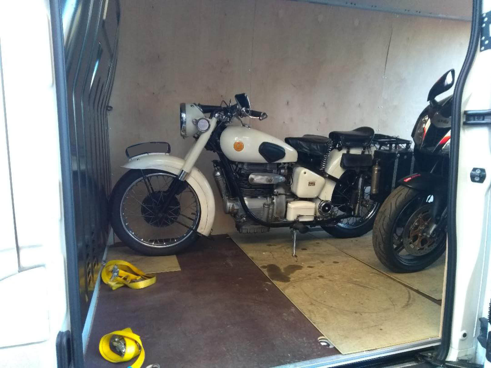 White bike loaded onto van | LBT Motorcycle Recovery
