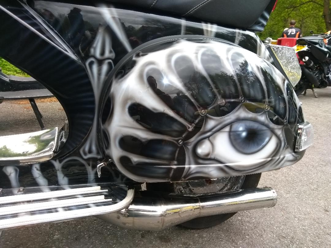 Custom painted eye on scooter | LBT Motorcycle Recovery
