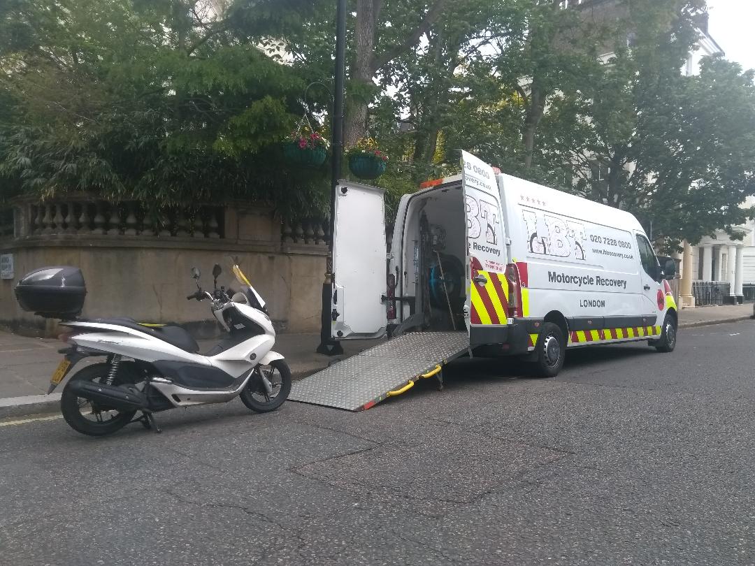 Silver scooter ready to load | LBT Motorcycle Recovery