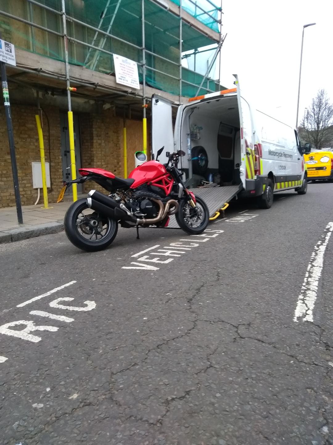 Red bike ready to load on board | LBT Motorcycle Recovery