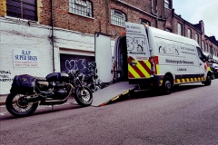 Large black bike being loaded | LBT Motorcycle Recovery