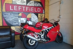 Red ducati in showroom | LBT Motorcycle Recovery