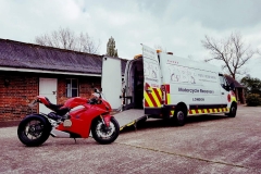 Red Ducati being loaded | LBT Motorcycle Recovery