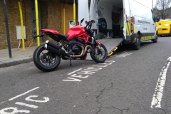 Red bike ready to load on board | LBT Motorcycle Recovery